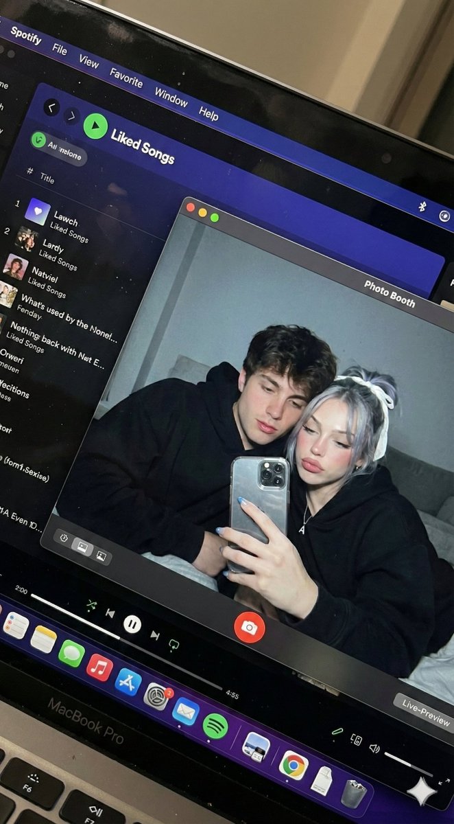 Young Couple Selfie on Laptop Screen | Candid Photobooth Image